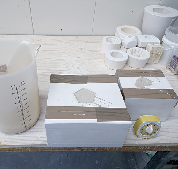 12 Casting porcelain in the tulip tower molds.