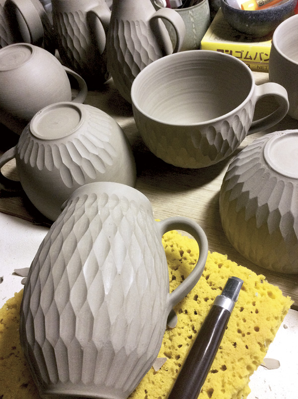5 Carving lattice patterns on leather-hard work.