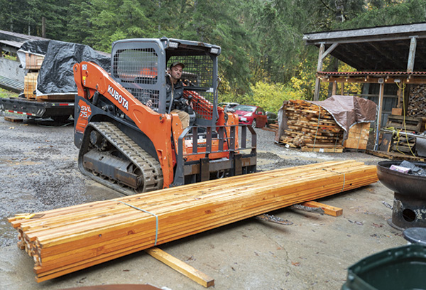 2 Robinson unloading wood to fire kilns. Fall 2024. Photo: Mario Gallucci.