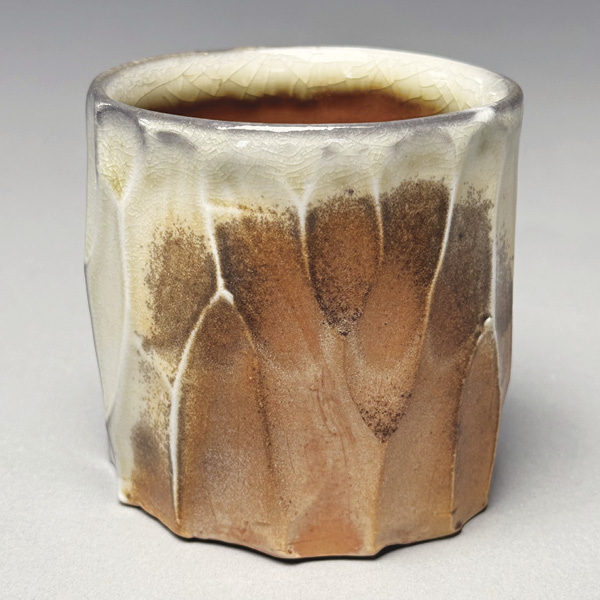 1 Donovan Palmquist’s cup, 4 in. (10.2 cm) in height, carved, Inner Glow Flashing Slip, wood fired, 2018.