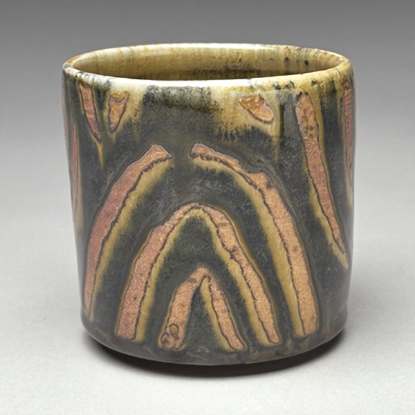 3 Donovan Palmquist’s teabowl, 4½ in. (11.4 cm) in diameter, wax resist, Barnard Amber Variation, wood fired, 2024.