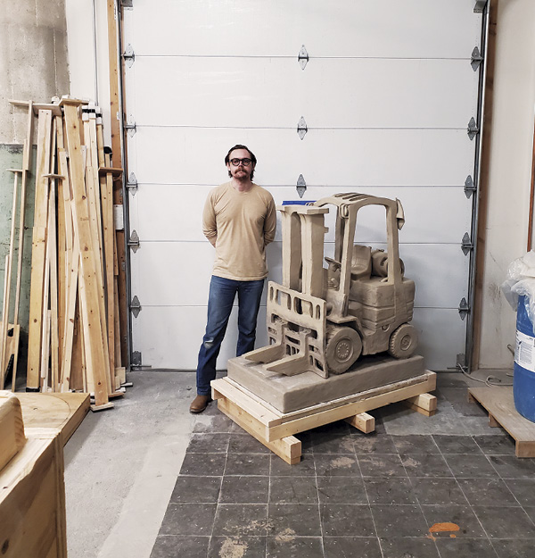 Michael Hurley with one of his sculptures.