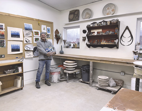 Donovan Palmquist standing in the studio