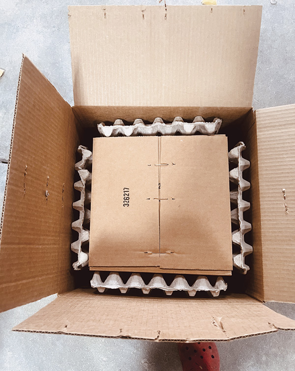 6 Tape a filler flat on each side of the interior to provide side cushioning.
