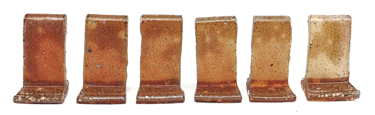 4 Test tiles fired with indirect soda contact using Joel Willson’s Soda Clay 20 (High Alumina XX Saggar) recipe (from left to right: control, 2.5, 5, 7.5, 10, and 15% added silica).