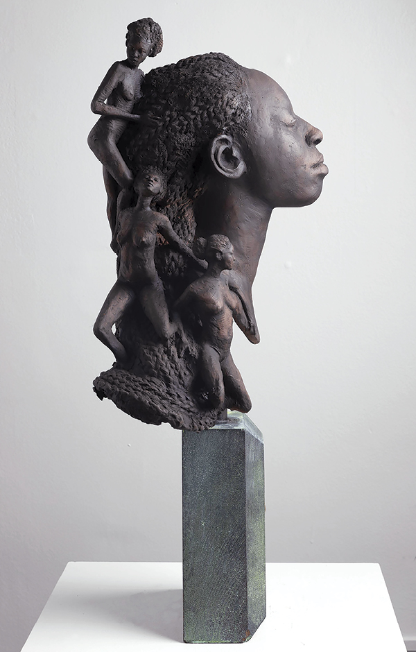 2 Mami Wata, 29 in. (74 cm) in height, terra cotta, bisque fired to cone 04 (1915°F (1046°C)), spray paint, polyethene, limestone base, bronze patina, 2023.