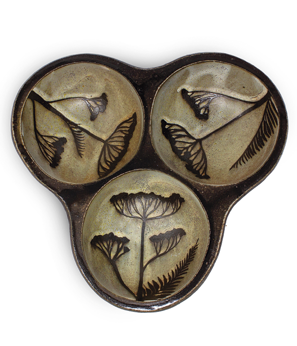 2 Yarrow Trefoil Server, 8 in. (20 cm) in height, handbuilt stoneware, colored base slip, hand-painted wax-resist decoration, bisque slip, wood fired to cone 10 with salt, 2022.