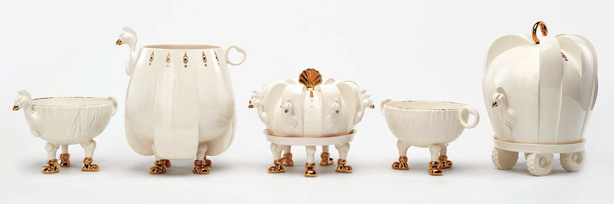 2 Parade, to 10 1/2 in. (27 cm) in height, earthenware, slip casting, 3D printing, clear glaze, fired to 2021°F (1100°C), laser engraving, silk screen, luster, gold, 2022. Photo: Catherine Dineley.