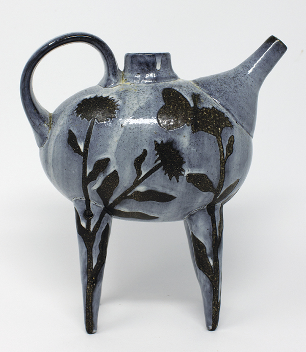 1 Christina Bendo’s Butterfly and Calendula Aquamanile, 8 in. (20 cm) in height, wheel-thrown and assembled stoneware, colored base slip, hand-painted wax-resist decoration, bisque slip, wood fired to cone 10 with salt, 2022.