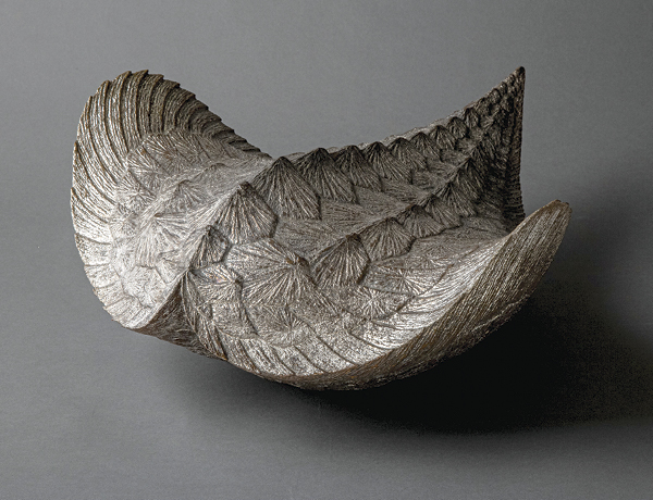1 Akashi Ryōtarō’s Tobu (Flight), 22 in. (56 cm) in length, stoneware, glaze, silver, 2022. Photo: Noda Kōichi. Courtesy of Joan B Mirviss LTD.