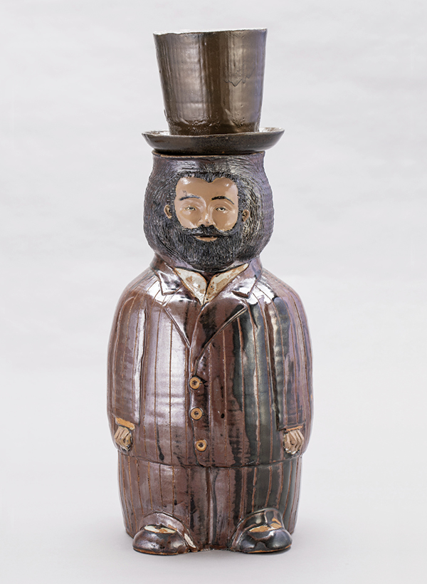 3 David Mack’s Elijah McCoy (1844–1929), wheel-thrown ceramic, detachable top hat, sculpted details, glazed, fired to cone 10 in gas reduction, acrylic paint, 2009.