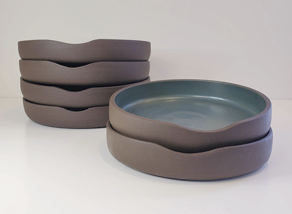 4 Subtractive Handle Plates, 9 in. (23 cm) in diameter, stoneware, 2021.