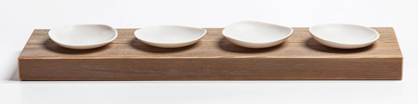 9 Sour, hot, bitter, and sweet, 4 in. (10 cm) in diameter (each), porcelain, cedar, 2022. Photo: Northern Clay Center.