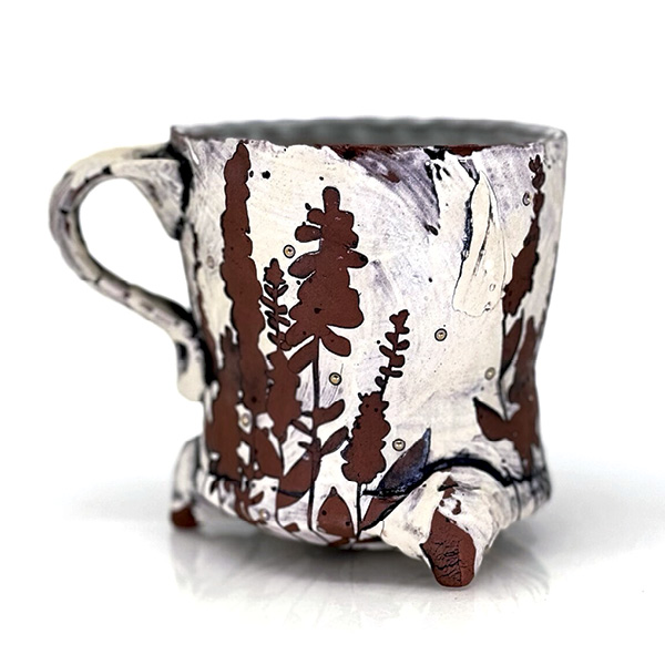 1 Sam Oliver’s footed mug, 3½ in. (8.9 cm) in width, earthenware, slip, glaze, fired to cone 1, luster accents, 2023.