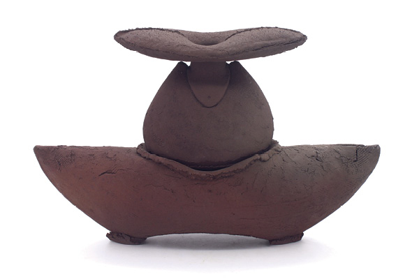 1 Sam McCall's Bottle Reliquary, 18 in. (45.7 cm) in length, handbuilt and wheel-thrown iron-rich stoneware, fired to cone 9, reduction cooled, 2024.
