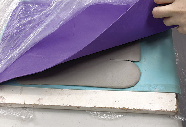3 For storing a slab, layer a ware board, craft foam, the slab, another sheet of foam, then dry cleaning plastic.