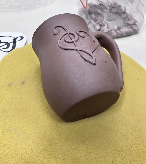 5 Upholstery foam with a hole in the middle helps keep the mug from rolling.