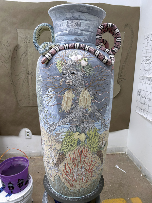 10 Finally, add black and the darkest details on the snake handles.