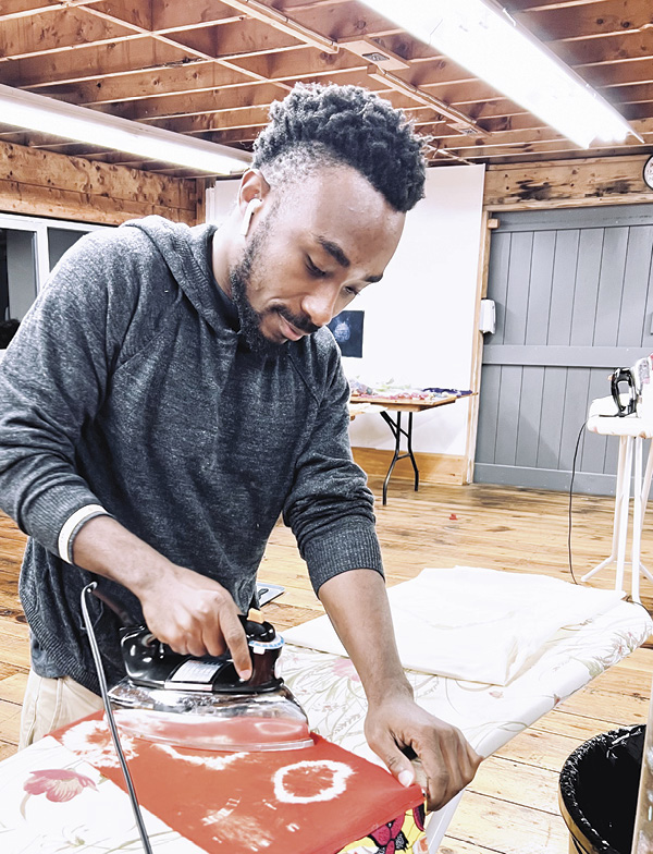5 2022 Artaxis Fellow Eugene Ofori Agyei working in the Haystack Mountain School of Crafts studios, summer 2022. Photo courtesy of Haystack Mountain School of Crafts.