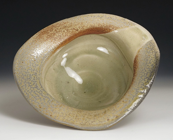 Triangle bowl, 8 in. (20 cm) in diameter, white stoneware, wood fired to cone 12, 2020.