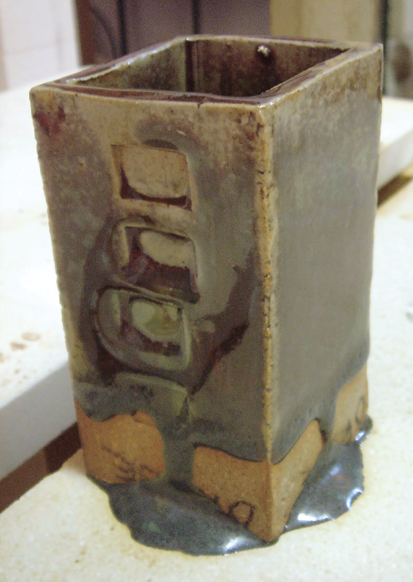5 Over-fired pottery exhibits glaze running on vertical surfaces and pooling on horizontal surfaces.