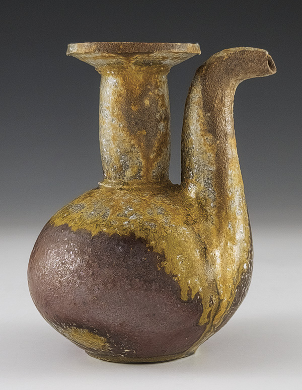 4 Ashton Keen’s ewer, 5½ in. (14 cm) in height, Starworks Ceramics’ Dark Star clay, Redart slip, fired cone 10 in a wood kiln, reduction cooled, 2025.