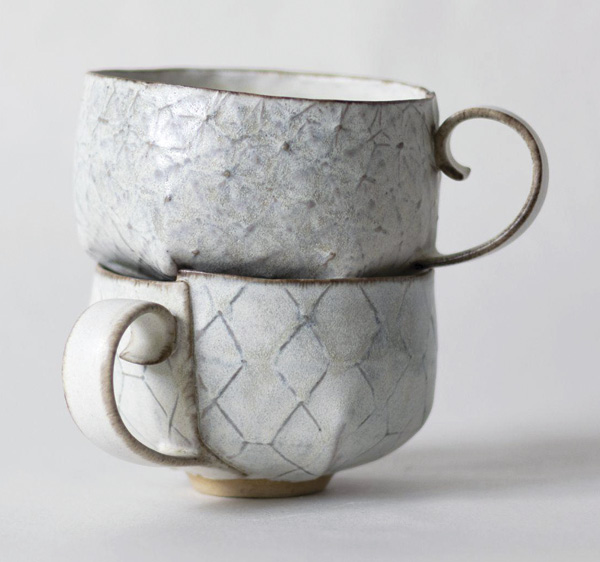 Clare Unger's Pleated Cups, 3 in. (8 cm) in height (each), Keanes 33 mid-range clay, cobalt and manganese oxides, mid-range satin matte glaze, 2025.
