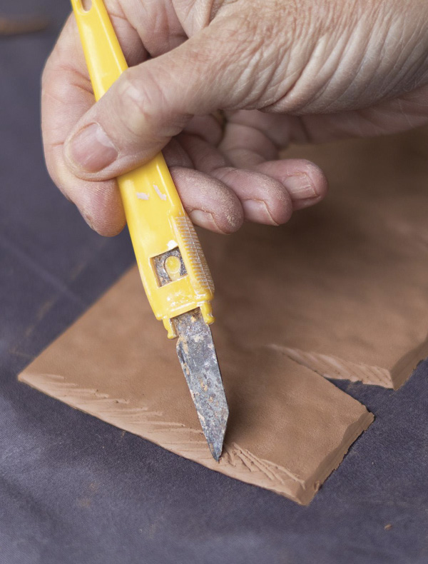 9 Score all edges to be joined using a knife.