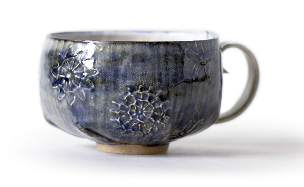 2 Clare Unger’s Pleated Cup, 4 in. (10 cm) in diameter, Keanes 33 mid-fire clay, mid-fire satin matte glaze, cobalt and manganese oxides, 2025.