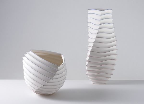 2 Mark Goudy’s Origami Open-form Series Objects (#1329 and #1342), to 12 in. (30 cm) in height, slip-cast unglazed porcelain, soluble metal salts (gold and cobalt), fired in oxidation to 2167°F (1186°C), wet sanded, 2022.