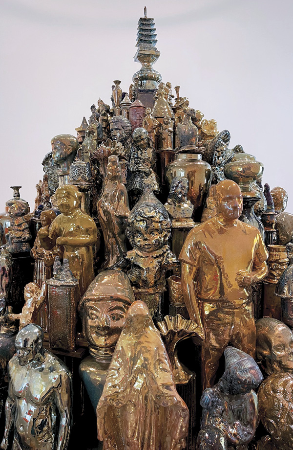 2 Walter McConnell’s A Theory of Everything–Gathering the Ancestors, 10 ft. (3 m) in diameter, cast porcelain, iridescent luster overglazes, plywood, 2022.