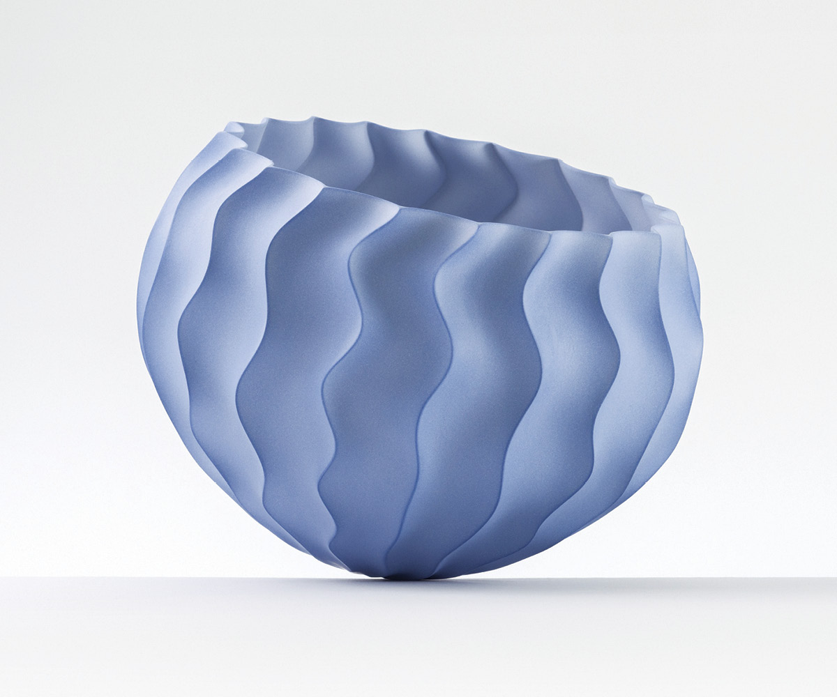 1 Waveform Series Object (#1234), 9½ in. (24 cm) in diameter, slip-cast unglazed porcelain, soluble metal salts (cobalt), fired to 2167°F (1186°C) in oxidation, wet sanded, 2021.