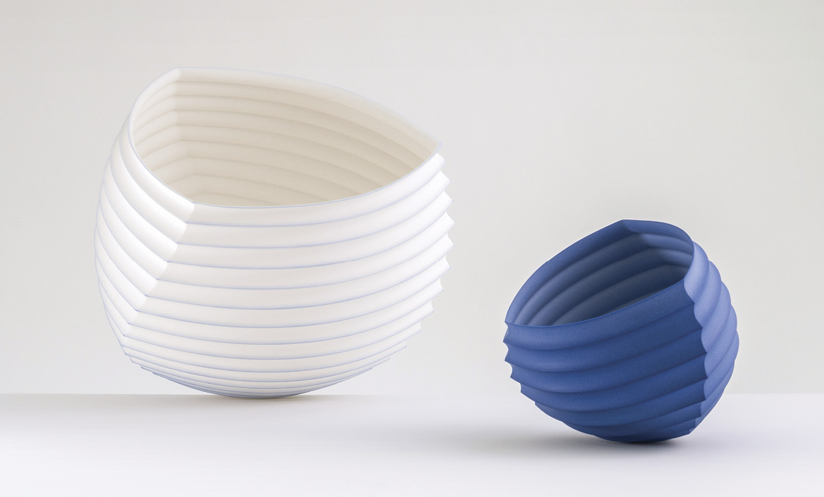 7 Origami Open-form Series Objects (#1227 and #1239), to 9 in. (23 cm) in diameter, slip-cast unglazed porcelain, soluble metal salts (cobalt), fired to 2167°F (1186°C) in oxidation, wet sanded, 2021.