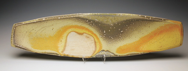 1 Tray, 7 in. (18 cm) in length, white stoneware, fired to cone 10 in a soda kiln, 2023.