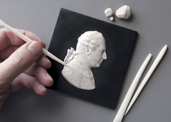 1 Model a bas-relief figure in wax or plasticine, avoiding all undercuts.