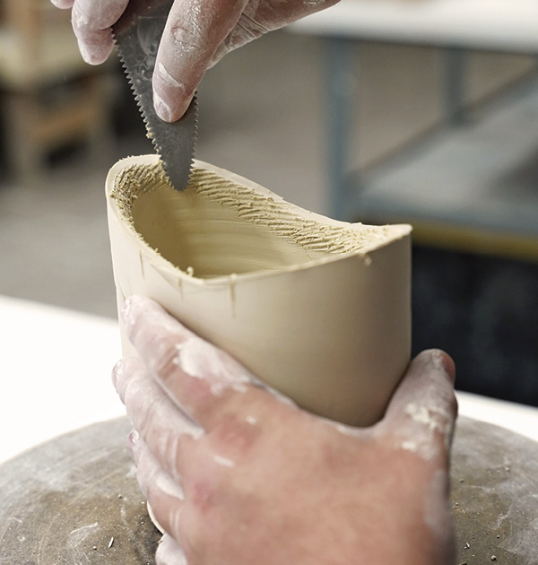 6 Address the cut edge of the form and use a serrated rib to remove the hard edge.