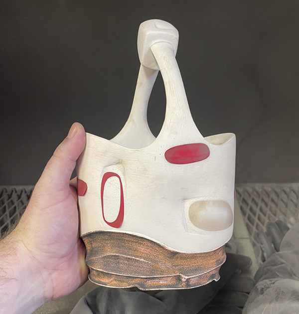 19 After sandblasting, the different underglaze colors should show through and the stenciled areas should be slightly raised, a similar result to water etching.