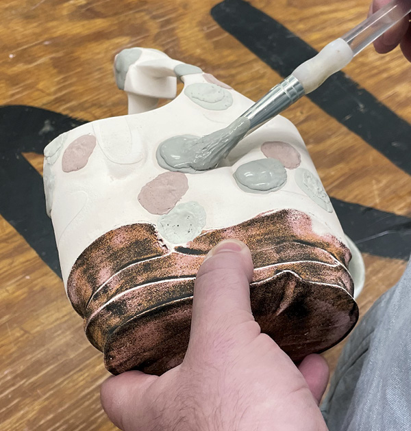20 Thoroughly wash and dry the basket, then apply various stained glazes, allowing enough space between clusters of dots.