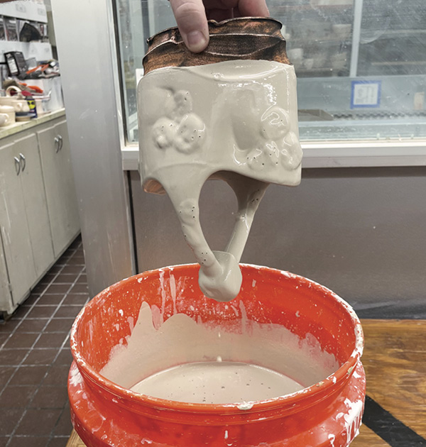 21 Dip the piece into a clear glaze and fire in an electric kiln to cone 6.