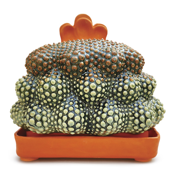 14 Sarah Mundy’s Butter Palace, 8 in. (20.3 cm) in height, handbuilt, coil-built, and slab-built white stoneware, slip, orange underglaze, green glaze, fired to cone 5, 2024.