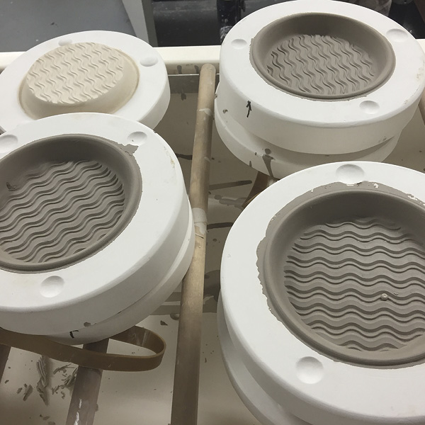 6 Front of solid-cast plate.