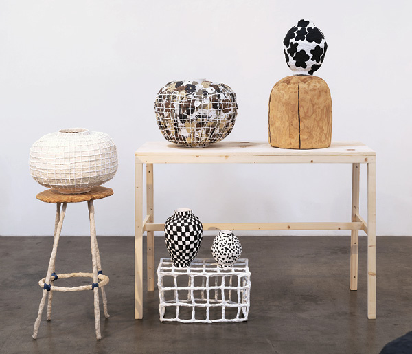 2 Left to right, top to bottom: Brittany Mojo's Wave like home, 17 in. (43.2 cm) in width, stoneware, porcelain appliqué, once fired to mid range in a gas kiln; Wherever you go, 17.5 in. (44.5 cm) in width, stoneware and porcelain appliqué on stoneware, once fired to mid range in a gas kiln; Mixed up Moon, 12.5 in. (31.8 cm) in height, porcelain, underglaze, once fired to cone 6 in an electric kiln; so much is soft (too), 8 in. (20.3 cm) in height, porcelain, underglaze, once fired to cone 6 in an electric kiln; 2021. Part of Mojo’s solo exhibition, Nowness. Photo: Mason Kuehler.
