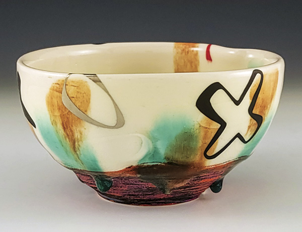 1 Ray Brown’s bowl, 6 in. (15.2 cm) in diameter, cone-6 porcelain, underglaze, cobalt stain, Campana Clear glaze with Mason stains, decals, 2024. Photo: Companion Gallery.