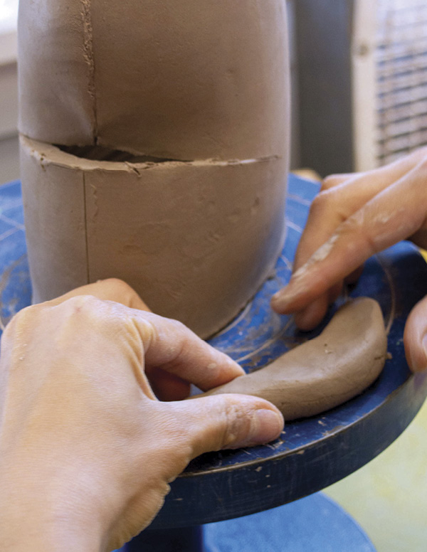 8 Flatten the tapered coil to match the size of the opening.