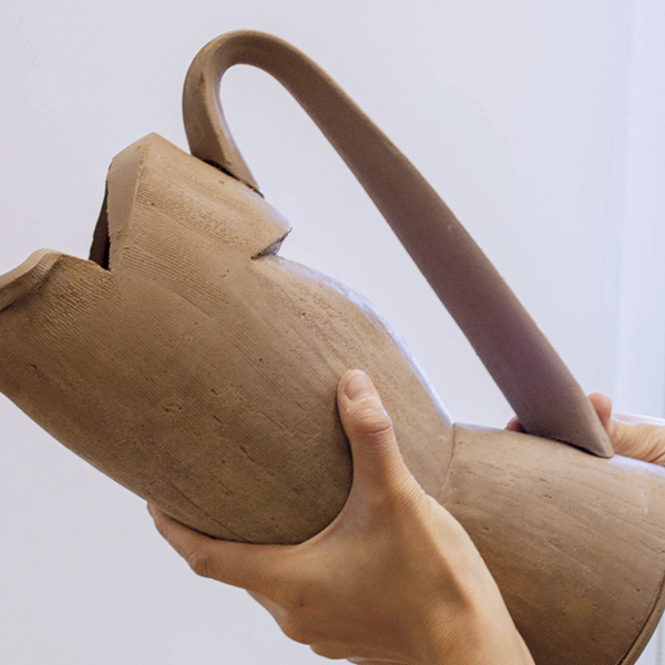 18 Slip, score, and attach the handle.