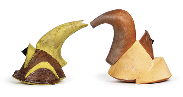 Amy Sanders' Two Pourers, up to 7 in. (17.8 cm) in height, earthenware, underglaze, terra sigillata, fired in oxidation to cone 2 in a soda kiln.