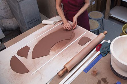 2 Cut the slab to the approximate shape and size of the template.