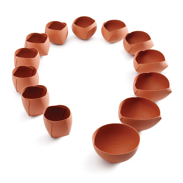 Ann Van Hoey transforms round shapes into a variety of forms inspired by origami and geometry, like those shown here from 2011. Photo: Dries Van den Brande.