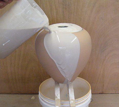 3 Pour on a layer of glaze.