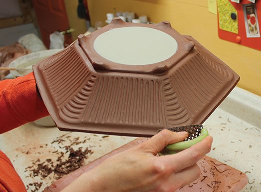 9 Carve surface texture using loop tools and trim the rim edge using a small rasp tool.